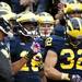 Michigan senior quarterback Denard Robinson prepares to take the field before the game against Illinois on Saturday. Daniel Brenner I AnnArbor.com